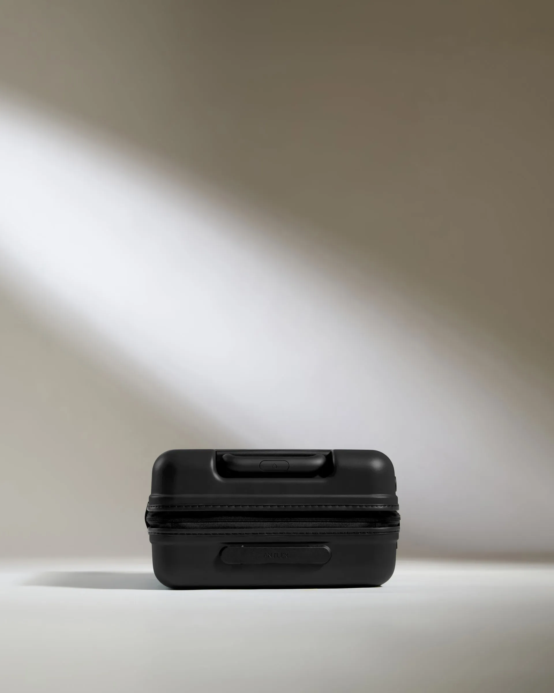 Cabin Suitcase in Black - Icon Stripe