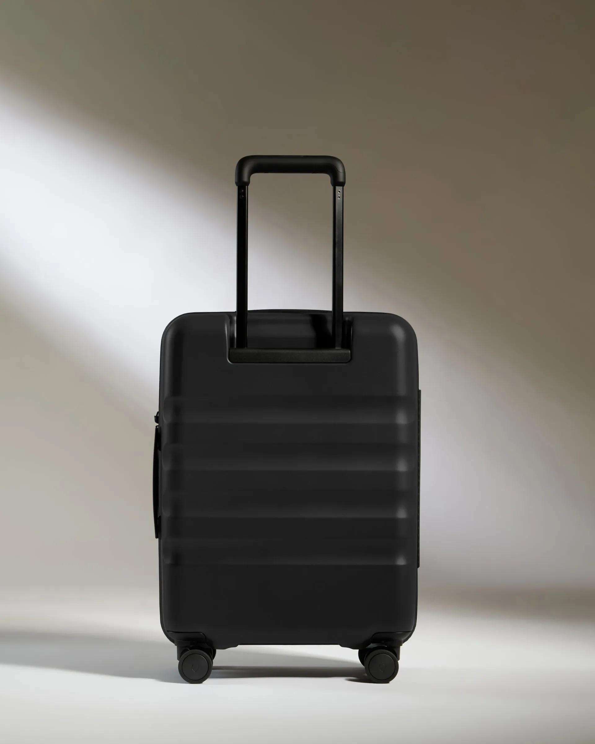 Cabin Suitcase in Black - Icon Stripe