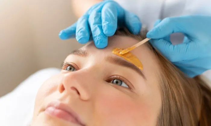 Facial, Brow Wax & Tint with Deluxe Gel Manicure or Pedicure at Iconic Hair and Beauty